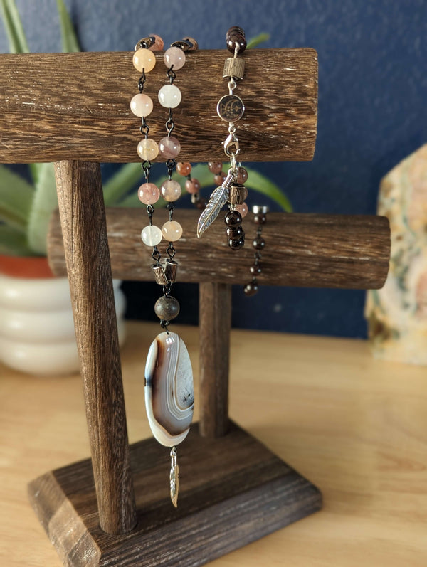 Rooted Feather Amulet